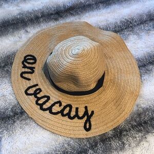On vacay beach wavy brown hat good sun protection cute beach accessory.